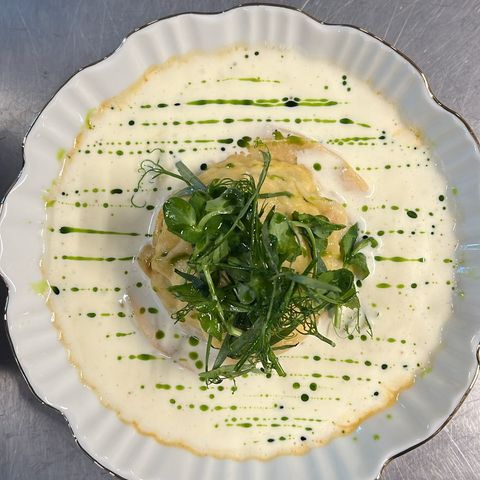 Crab and Lobster Ravioli, Champagne and Parmesan Beurre Blanc and Basil Oil